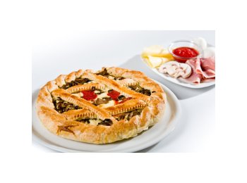 Torta salata prosciutto e funghi cotta